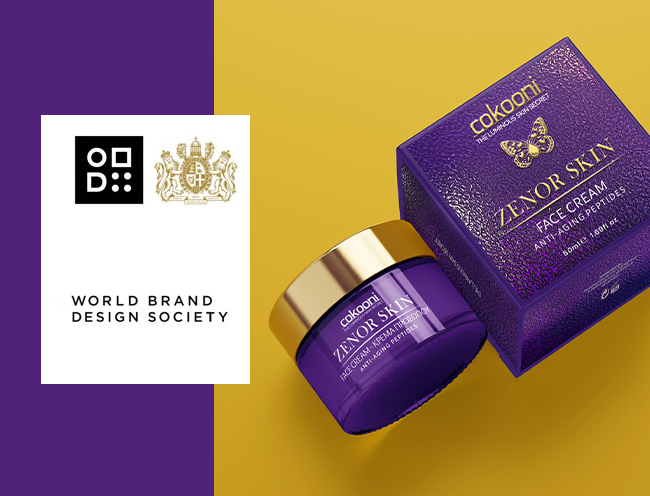 Award-winning premium cosmetic packaging design for Cokooni Zenor Skin face cream by ABC Design Communication, recognized by the World Brand Design Society, featuring a sophisticated textured purple box, elegant gold foil typography, and a luxurious matching jar.