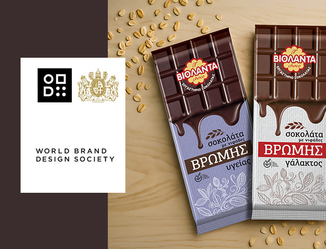 Premium packaging design for Violanta oat chocolate bars by ABC Design, featuring elegant botanical illustrations and high-end typography, displayed alongside the World Brand Design Society logo.