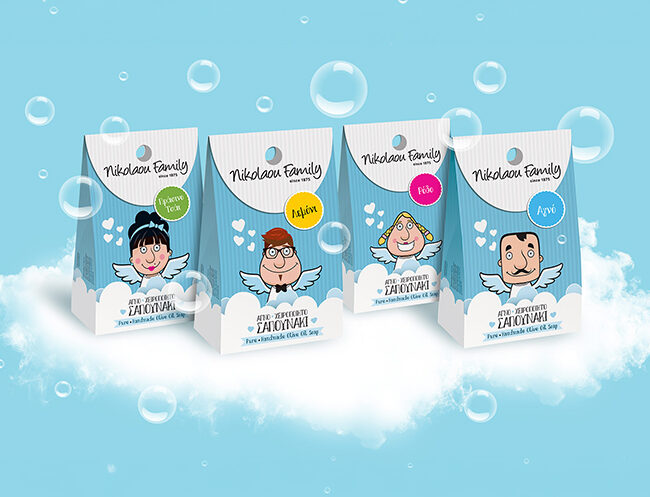 Premium packaging design for Nikolaou Family handmade olive oil soaps by ABC Design, illustrating custom character-driven brand storytelling on structured paper pouches floating amidst clouds and bubbles.