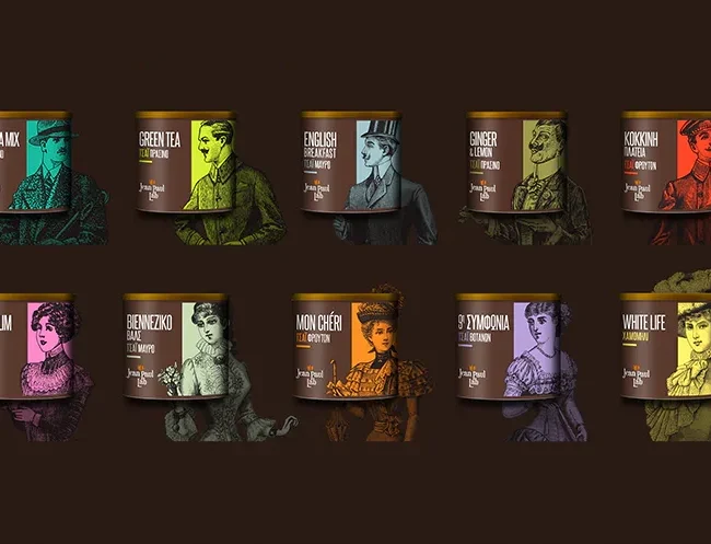 Premium Jean Paul Labs tea packaging tins featuring vintage human illustrations and distinct color coding for each flavor.