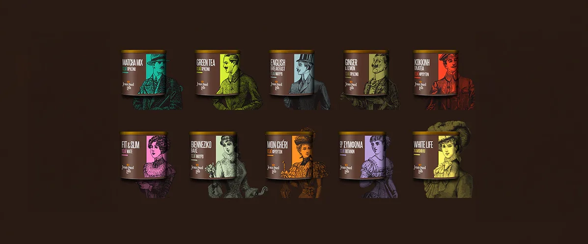 Premium Jean Paul Labs tea packaging tins featuring vintage human illustrations and distinct color coding for each flavor.