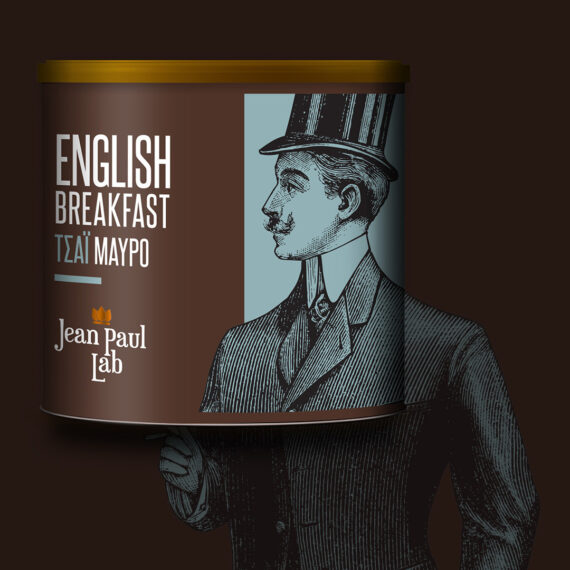 High-end square portfolio mockup of Jean Paul Lab English Breakfast tea packaging, showcasing a vintage-style hand-drawn engraving of a classical gentleman in a top hat on a pastel blue color-blocked label.