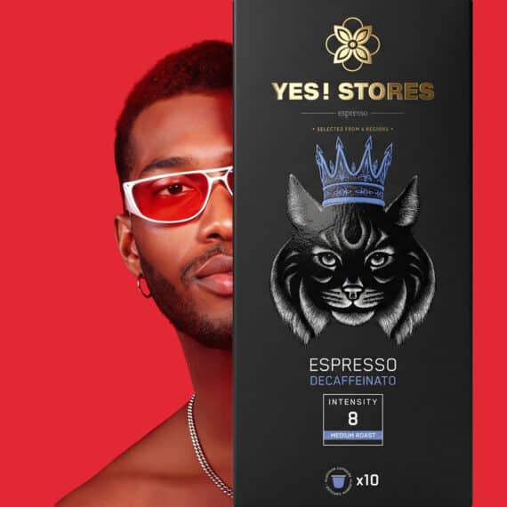 Man with red sunglasses next to lynx espresso box, decaf coffee packaging design by ABC Design Communication.